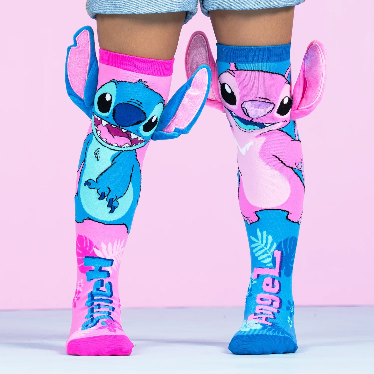 Colorful Madmia socks for kids featuring Stitch and Angel characters with 3D ears, perfect for playtime.